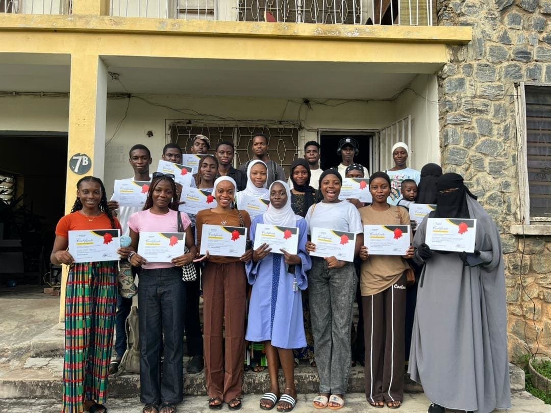 PractiCode Academy students with their certificates outside our Old Bodija centre